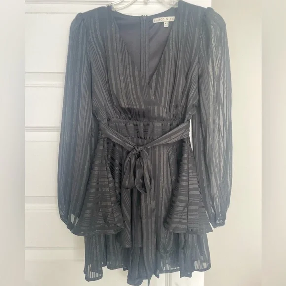 Allison and Kelly(Dillards) sparkly black tiered romper
Size XS - Picture 1 of 2